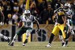 PITTSBURGH, PA - JANUARY 23:  Jerricho Cotchery #89 of the New York Jets runs for yards after the catch against the Pittsburgh Steelers during the 2011 AFC Championship game at Heinz Field on January 23, 2011 in Pittsburgh, Pennsylvania. The Steelers won 24-19.  (Photo by Al Bello/Getty Images)
