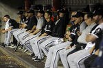 DETROIT - SEPTEMBER 04:  Players of the Chicago White Sox sit in the dugout during the game against the Detroit Tigers, after the Tigers scored 16 runs on 22 hits in the first sixth innings of the game at Comerica Park on September 4, 2011 in Detroit, Michigan.  (Photo by Leon Halip/Getty Images)