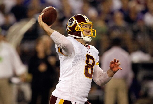BALTIMORE, MD - AUGUST 25:  Quarterback Rex Grossman #8 of the Washington Redskins drops back to pass against the Baltimore Ravens at M&T Bank Stadium on August 25, 2011 in Baltimore, Maryland.  (Photo by Rob Carr/Getty Images)