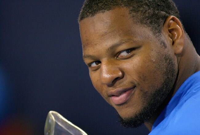 ORCHARD PARK, NY - SEPTEMBER 01:  Ndamukong Suh #90 of the Detroit Lions sits on the sidelines against the Buffalo Bills at Ralph Wilson Stadium on September 1, 2011 in Orchard Park, New York.  (Photo by Rick Stewart/Getty Images)