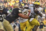 Denard-robinson-heisman-pose_crop_150x100