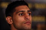 LAS VEGAS, NV - JULY 23:  Amir Khan answers questions after his fifth round knockout victory against Zab Judah in their super lightweight world championship unification bout at Mandalay Bay Events Center on July 23, 2011 in Las Vegas, Nevada.  (Photo by Scott Heavey/Getty Images)