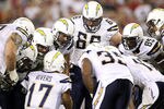 GLENDALE, AZ - AUGUST 27:  The San Diego Chargers huddle up around quarterback Philip Rivers #17 during the preseason NFL game against the Arizona Cardinals at the University of Phoenix Stadium on August 27, 2011 in Glendale, Arizona.  The Chargers defeated the Cardinals 34-31.  (Photo by Christian Petersen/Getty Images)