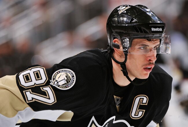 PITTSBURGH, PA - DECEMBER 20:  Sidney Crosby #87 of the Pittsburgh Penguins gets ready to take a face off against the Phoenix Coyotes on December 20, 2010 at CONSOL Energy Center in Pittsburgh, Pennsylvania.  (Photo by Jamie Sabau/Getty Images)