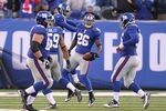 EAST RUTHERFORD, NJ - NOVEMBER 28:  Antrel Rolle #26 of the New York Giants celebrates his fumble recovery against the Jacksonville Jaguars during the final minutes of their 24-20 win on November 28, 2010 at The New Meadowlands Stadium in East Rutherford, New Jersey.  (Photo by Al Bello/Getty Images)
