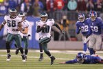 EAST RUTHERFORD, NJ - DECEMBER 19:  DeSean Jackson #10 of the Philadelphia Eagles eludes Matt Dodge #6 of the New York Giants and returns a punt for the winning touchdown as time runs out defeating the Giants 38-31 during their game on December 19, 2010 at The New Meadowlands Stadium in East Rutherford, New Jersey.  (Photo by Al Bello/Getty Images)