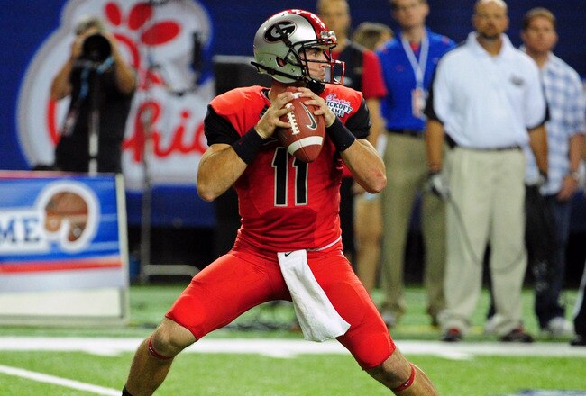 ATLANTA - SEPTEMBER 3: Aaron Murray #11 of the Georgia Bulldogs passes against the Boise State Broncos during the Chick-Fil-A Kickoff Game at the Georgia Dome on September 3, 2011 in Atlanta, Georgia. Photo by Scott Cunningham/Getty Images)