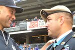 NEW YORK, NY - SEPTEMBER 07: Derek Jeter #2 of the New York Yankees (L) shakes hands with Metal of Honor recipient Leroy Petry during a pregame ceremony commemorating the Tenth Anniversary of the September 11th attacks on September 7, 2011 at Yankee Stadium in the Bronx borough of New York City. (Photo by Christopher Pasatieri/Getty Images)