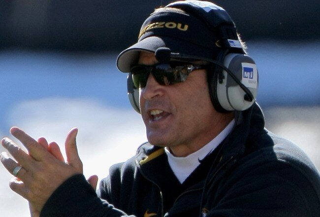 BOULDER, CO - OCTOBER 31:  Head coach Gary Pinkel of the Missouri Tigers leads his team against the Colorado Buffaloes at Folsom Field on October 31, 2009 in Boulder, Colorado.  (Photo by Doug Pensinger/Getty Images)