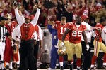 SAN FRANCISCO - SEPTEMBER 20:  Vernon Davis #85 and head coach Mike Singletary of the San Francisco 49ers celebrate a two-point conversion ruling was reversed in their favor due to instant replay during their game against the New Orleans Saints at Candlestick Park on September 20, 2010 in San Francisco, California.  (Photo by Ezra Shaw/Getty Images)