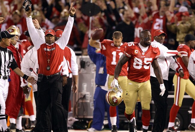 SAN FRANCISCO - SEPTEMBER 20:  Vernon Davis #85 and head coach Mike Singletary of the San Francisco 49ers celebrate a two-point conversion ruling was reversed in their favor due to instant replay during their game against the New Orleans Saints at Candlestick Park on September 20, 2010 in San Francisco, California.  (Photo by Ezra Shaw/Getty Images)