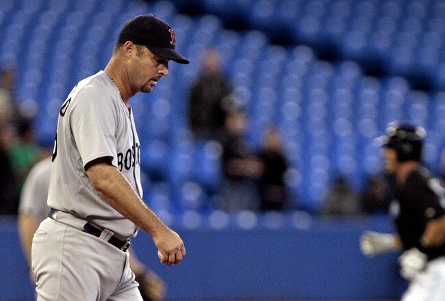 TORONTO, CANADA - SEPTEMBER 7:  J.P. Arencibia #9 of the Toronto Blue Jays rounds second after a two-run home run off of Tim Wakefield #49 of the Boston Red Sox during MLB action at the Rogers Centre September 7, 2011 in Toronto, Ontario, Canada. (Photo by Abelimages/Getty Images)