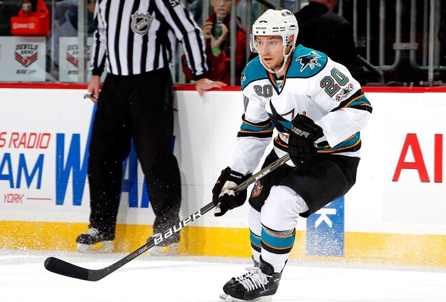 NEWARK, NJ - FEBRUARY 11: Kyle Wellwood #20 of the San Jose Sharks skates during an NHL hockey game against the New Jersey Devils on February 11, 2011 at the Prudential Center in Newark, New Jersey. (Photo by Paul Bereswill/Getty Images)