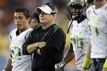GLENDALE, AZ - JANUARY 10:  Head coach Chip Kelly of the Oregon Ducks looks on against the Auburn Tigers in the Tostitos BCS National Championship Game at University of Phoenix Stadium on January 10, 2011 in Glendale, Arizona.  (Photo by Ronald Martinez/Getty Images)