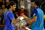 MONTREAL, QC - AUGUST 11: Roger Federer of Switzerland congratulates Jo-Wilfried Tsonga of France after their match during the Rogers Cup at Uniprix Stadium on August 11, 2011 in Montreal, Canada.  (Photo by Matthew Stockman/Getty Images)