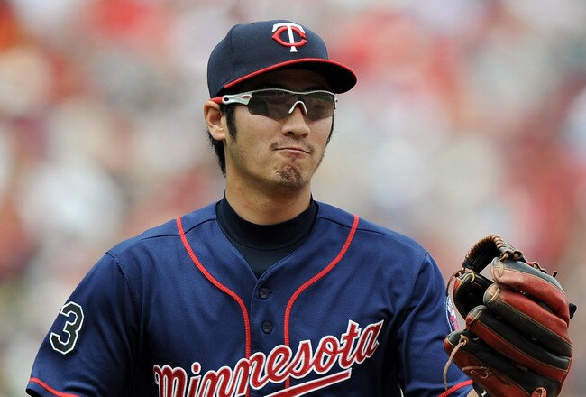 ANAHEIM, CA - SEPTEMBER 04:  Tsuyoshi Nishioka #1 of the Minnesota Twins reacts after his infield play for an out of Howard Kendrick #47 of the Los Angeles Angels of Anaheim  to end the fifth inning against the Los Angeles Angels of Anaheim at Angel Stadium of Anaheim on September 4, 2011 in Anaheim, California.  (Photo by Harry How/Getty Images)