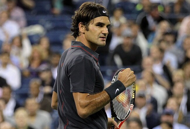 NEW YORK, NY - SEPTEMBER 08:  Roger Federer of Switzerland celebrates after he wom match point against Jo-Wilfried Tsonga of France during Day Eleven of the 2011 US Open at the USTA Billie Jean King National Tennis Center on September 8, 2011 in the Flushing neighborhood of the Queens borough of New York City.  (Photo by Matthew Stockman/Getty Images)