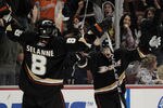 ANAHEIM, CA - MARCH 19:  Lubomir Visnovsky #17 of the Anaheim Ducks celebrates his game tying goal with Teemu Selanne #8 to send the game into overtime against the New York Islanders during the third period at the Honda Center on March 19, 2010 in Anaheim, California.  (Photo by Harry How/Getty Images)