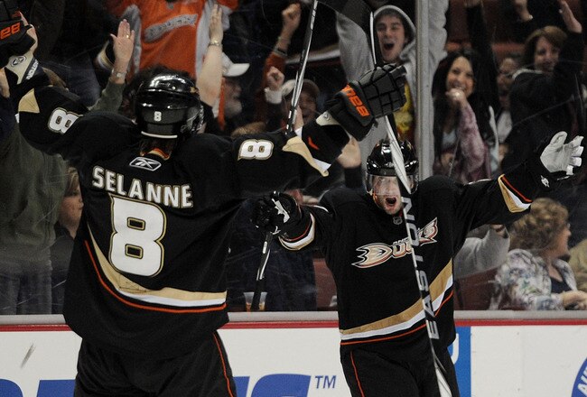 ANAHEIM, CA - MARCH 19:  Lubomir Visnovsky #17 of the Anaheim Ducks celebrates his game tying goal with Teemu Selanne #8 to send the game into overtime against the New York Islanders during the third period at the Honda Center on March 19, 2010 in Anaheim, California.  (Photo by Harry How/Getty Images)