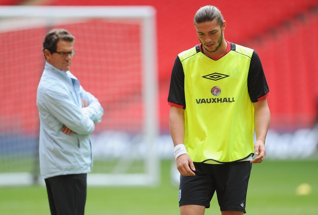 LONDON, ENGLAND - SEPTEMBER 05: Andy Carroll and Fabio Capello look on during the England training session ahead of their UEFA EURO 2012 Group G qualifier against Wales at Wembley Stadium on September 5, 2011 in London, England.  (Photo by Michael Regan/Getty Images)