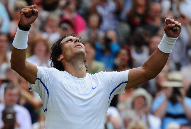 LONDON, ENGLAND - JULY 01:  Rafael Nadal of Spain celebrates celebrates after winning his semifinal round match against Andy Murray of Great Britain on Day Eleven of the Wimbledon Lawn Tennis Championships at the All England Lawn Tennis and Croquet Club on July 1, 2011 in London, England.  (Photo by Clive Mason/Getty Images)