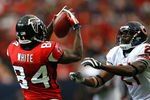 ATLANTA - OCTOBER 12:  Receiver Roddy White #84 of the Atlanta Falcons pulls in this reception against Corey Graham #21 of the Chicago Bears during the game at the Georgia Dome on October 12, 2008 in Atlanta, Georgia.  (Photo by Kevin C. Cox/Getty Images)