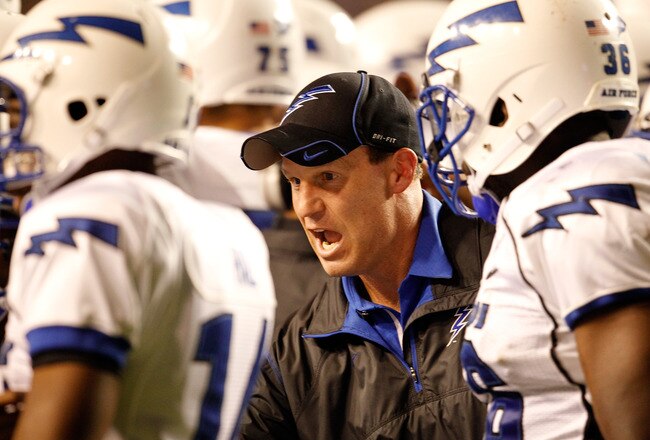 FORT WORTH, TX - OCTOBER 23:  Head coach Troy Calhoun of the Air Force Falcons leads his team on the field against the TCU Horned Frogs at Amon G. Carter Stadium on October 23, 2010 in Fort Worth, Texas.  (Photo by Tom Pennington/Getty Images)