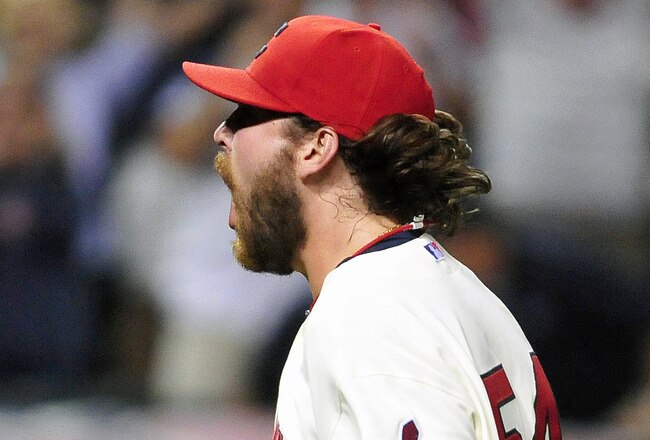 CLEVELAND, OH - AUGUST 27: Closing pitcher Chris Perez #54 of the Cleveland Indians pumps his fist in celebration after the final strike to win the game 8-7 against the Kansas City Royals at Progressive Field on August 27, 2011 in Cleveland, Ohio. (Photo by Jason Miller/Getty Images)
