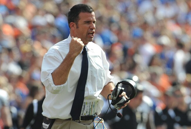 GAINESVILLE, FL - NOVEMBER 21: Coacg Mario Cristobal of the Florida International University Golden Panthers directs play against the Florida Gators, November 21, 2009 at Ben Hill Griffin Stadium in Gainesville, Florida.  (Photo by Al Messerschmidt/Getty Images)