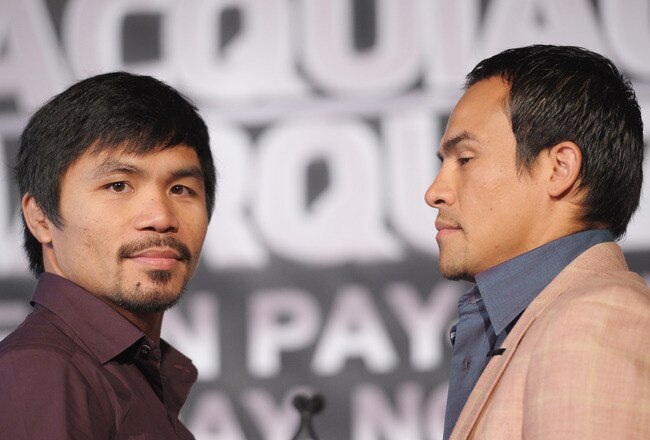 NEW YORK, NY - SEPTEMBER 06:  Professional Boxers Manny Pacquiao (L) and Juan Manuel Marquez attend the press conference for their World Welterweight Championship Fight at The Lighthouse at Chelsea Piers on September 6, 2011 in New York City.  (Photo by Michael Loccisano/Getty Images)