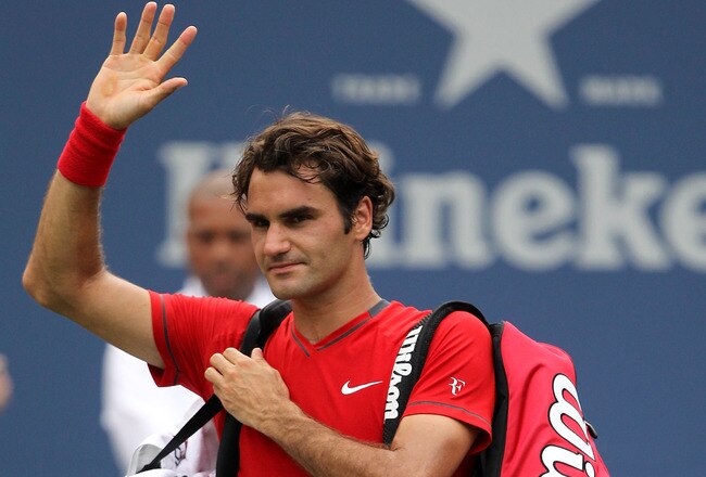 NEW YORK, NY - SEPTEMBER 10:  Roger Federer of Switzerland walks off the court after he lost to Novak Djokovic of Serbia during Day Thirteen of the 2011 US Open at the USTA Billie Jean King National Tennis Center on September 10, 2011 in the Flushing neighborhood of the Queens borough of New York City.  (Photo by Al Bello/Getty Images)