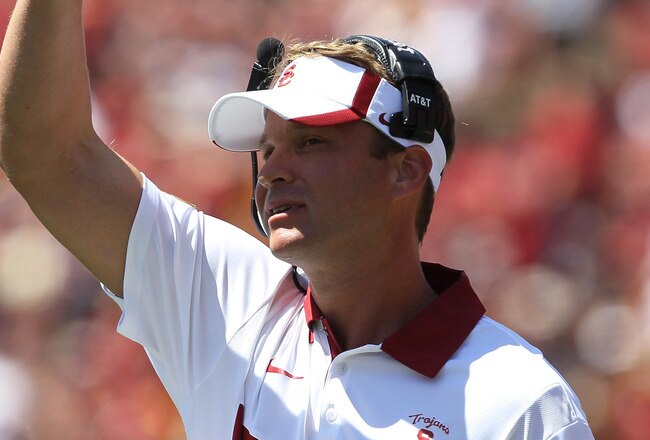 LOS ANGELES, CA - SEPTEMBER 03:  Head coach Lane Kiffin of the USC Trojans gestures in the game with the Minnesota Golden Gophers at the Los Angeles Memorial Coliseum on September 3, 2011 in Los Angeles, California. USC won 19-17.  (Photo by Stephen Dunn/Getty Images)