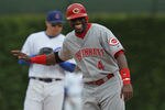 CHICAGO, IL - SEPTEMBER 05: Brandon Phillips #4 of the Cincinnati Reds laughs at outfielder Marlon Byrd of the Chicago Cubs as he stands near 2nd base at Wrigley Field on September 5, 2011 in Chicago, Illinois. The Cubs defeated the Reds 4-3.  (Photo by Jonathan Daniel/Getty Images)
