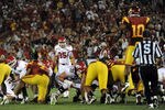 LOS ANGELES, CA - SEPTEMBER 10:  Coleman Petersen #95 of the Utah Utes lines up a field goal in the final seconds of the game against the USC Trojans at Los Angeles Memorial Coliseum on September 10, 2011 in Los Angeles, California.  The field goal was blocked to preserve a 17-14 Trojan win.  (Photo by Harry How/Getty Images)
