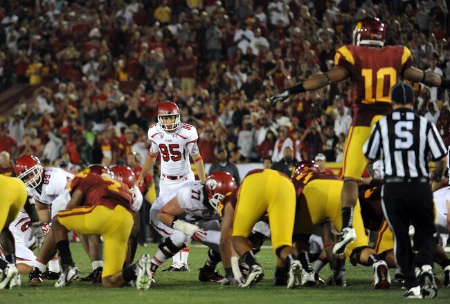 LOS ANGELES, CA - SEPTEMBER 10:  Coleman Petersen #95 of the Utah Utes lines up a field goal in the final seconds of the game against the USC Trojans at Los Angeles Memorial Coliseum on September 10, 2011 in Los Angeles, California.  The field goal was blocked to preserve a 17-14 Trojan win.  (Photo by Harry How/Getty Images)