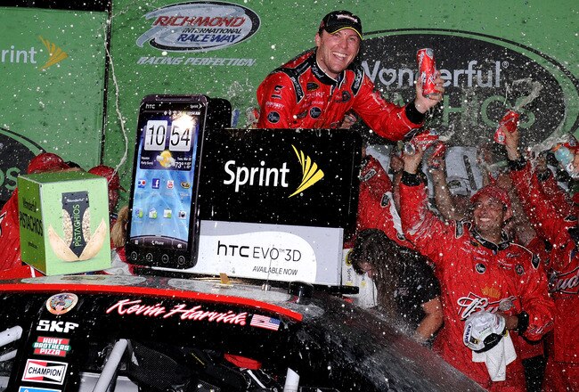 RICHMOND, VA - SEPTEMBER 10:  Kevin Harvick, driver of the #29 Budweiser Chevrolet, celebrates in victory lane after winning the NASCAR Sprint Cup Series Wonderful Pistachios 400 at Richmond International Raceway on September 10, 2011 in Richmond, Virginia.  (Photo by Patrick Smith/Getty Images for NASCAR)