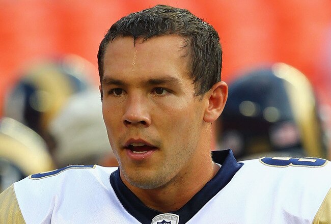 KANSAS CITY, MO - AUGUST 26: Sam Bradford #8 of the St. Louis Rams arms up prior to playing against the Kansas City Chiefs during a pre-season game at Arrowhead Stadium  on August 26, 2010 in Kansas City, Missouri.  The Rams defeated the Chiefs, 14-10. (Photo by Dilip Vishwanat/Getty Images)