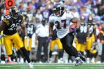 BALTIMORE, MD - SEPTEMBER 11:  Ray Rice #27 of the Baltimore Ravens runs the ball against the Pittsburgh Steelers at M&T Bank Stadium on September 11, 2011 in Baltimore, Maryland. The Ravens defeated the Steelers 35-7. (Photo by Larry French/Getty Images)