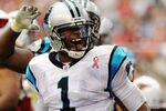 GLENDALE, AZ - SEPTEMBER 11:  Quarterback Cam Newton #1 of the Carolina Panthers celebrates his first rushing touchdown against the Arizona Cardinals in the NFL season opening game at the University of Phoenix Stadium on September 11, 2011 in Glendale, Arizona. Arizona won 28-21. (Photo by Norm Hall/Getty Images)
