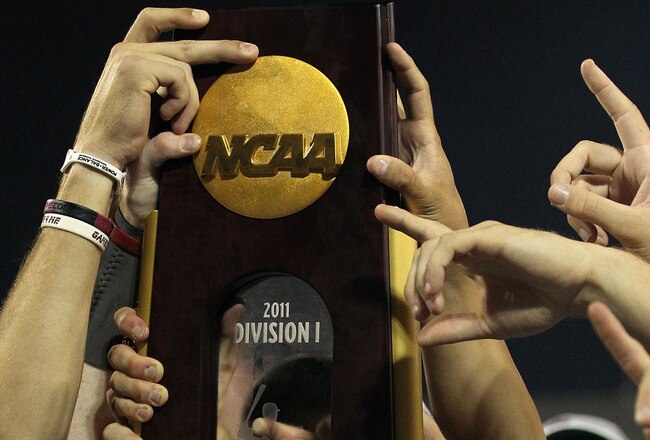 OMAHA, NE - JUNE 28:  The South Carolina Gamecocks celebrate with the trophy after winning the men's 2011 NCAA College Baseball World Series at TD Ameritrade Park Omaha on June 28, 2011 in Omaha, Nebraska.  The Gamecocks defeated the Florida Gators 5-2 and won the series 2-0.  (Photo by Ronald Martinez/Getty Images)