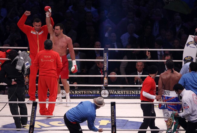 HAMBURG, GERMANY - JULY 02:  Wladimir Klitschko celebrates with his brother Vitali Klitschko on the final bell after his heavey weight title fight with David Haye at the Imtech Arena on July 2, 2011 in Hamburg, Germany.  (Photo by Scott Heavey/Getty Images)