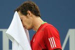 NEW YORK, NY - SEPTEMBER 10:  Andy Murray of Great Britain wipes his face with a towel against Rafael Nadal of Spain during Day Thirteen of the 2011 US Open at the USTA Billie Jean King National Tennis Center on September 10, 2011 in the Flushing neighborhood of the Queens borough of New York City.  (Photo by Al Bello/Getty Images)