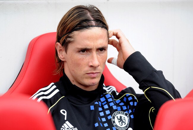 SUNDERLAND, ENGLAND - SEPTEMBER 10:  Fernando Torres of Chelsea looks on from the bench during the Barclays Premier League match between Sunderland and Chelsea at the Stadium of Light on September 10, 2011 in Sunderland, England.  (Photo by Michael Regan/Getty Images)