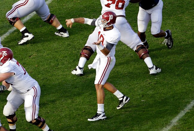 STATE COLLEGE, PA - SEPTEMBER 10: Quarterback AJ McCarron #10 of the Alabama Crimson Tide throws a pass against the Penn State Nittany Lions during the second half at Beaver Stadium on September 10, 2011 in State College, Pennsylvania.  (Photo by Rob Carr/Getty Images)