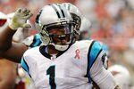 GLENDALE, AZ - SEPTEMBER 11:  Quarterback Cam Newton #1 of the Carolina Panthers celebrates his first rushing touchdown against the Arizona Cardinals in the NFL season opening game at the University of Phoenix Stadium on September 11, 2011 in Glendale, Arizona. Arizona won 28-21. (Photo by Norm Hall/Getty Images)