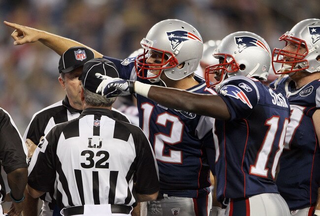 FOXBORO, MA - SEPTEMBER 01:  Tom Brady #12 and  Matthew Slater #18 of the New England Patriots react after the play is initially called short in the endzone against the New York Giants on September 1, 2011 at Gillette Stadium in Foxboro, Massachusetts.The play was later ruled a touchdown.  (Photo by Elsa/Getty Images)