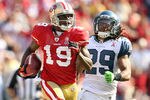 SAN FRANCISCO, CA - SEPTEMBER 11:  Ted Ginn #19 of the San Francisco 49ers outruns Earl Thomas #29 of the Seattle Seahawks on his way to scoring a touchdown on a kickoff return during their season opener at Candlestick Park on September 11, 2011 in San Francisco, California.  (Photo by Ezra Shaw/Getty Images)