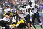 BALTIMORE, MD - SEPTEMBER 11:  Ricky Williams #34 of the Baltimore Ravens runs the ball against the Pittsburgh Steelers at M&T Bank Stadium on September 11, 2011 in Baltimore, Maryland. The Ravens defeated the Steelers 35-7. (Photo by Larry French/Getty Images)