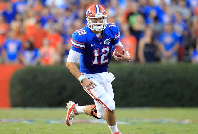 GAINESVILLE, FL - SEPTEMBER 10:  John Brantley #12 of the Florida Gators runs for yardage during a game against the UAB Blazers at Ben Hill Griffin Stadium on September 10, 2011 in Gainesville, Florida.  (Photo by Sam Greenwood/Getty Images)