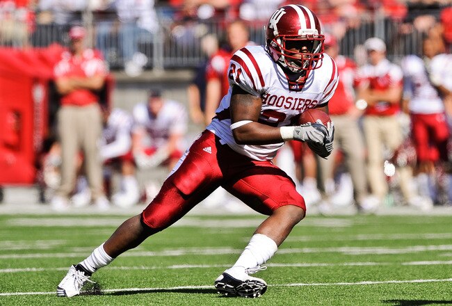 COLUMBUS, OH - OCTOBER 9:  Trea Burgess #21 of the Indiana Hoosiers runs with the ball against the Ohio State Buckeyes at Ohio Stadium on October 9, 2010 in Columbus, Ohio.  (Photo by Jamie Sabau/Getty Images)